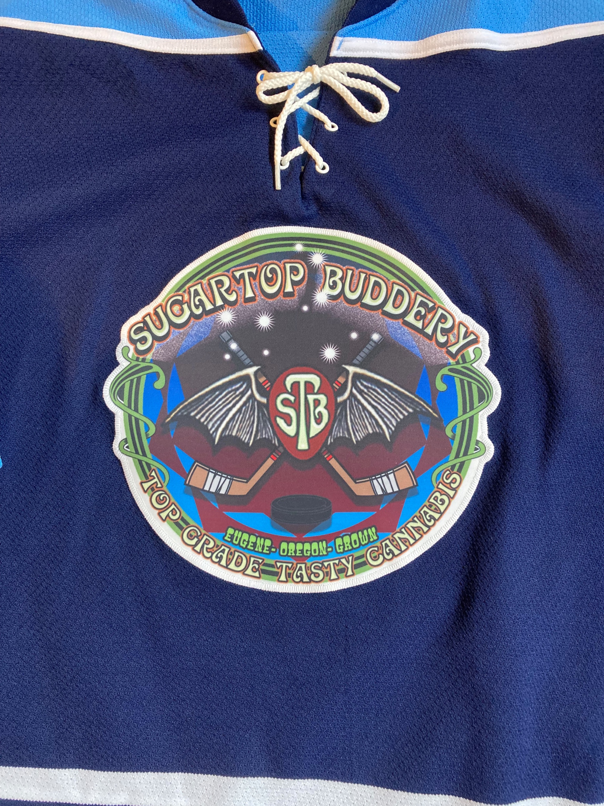 Bat logo on dark jersey