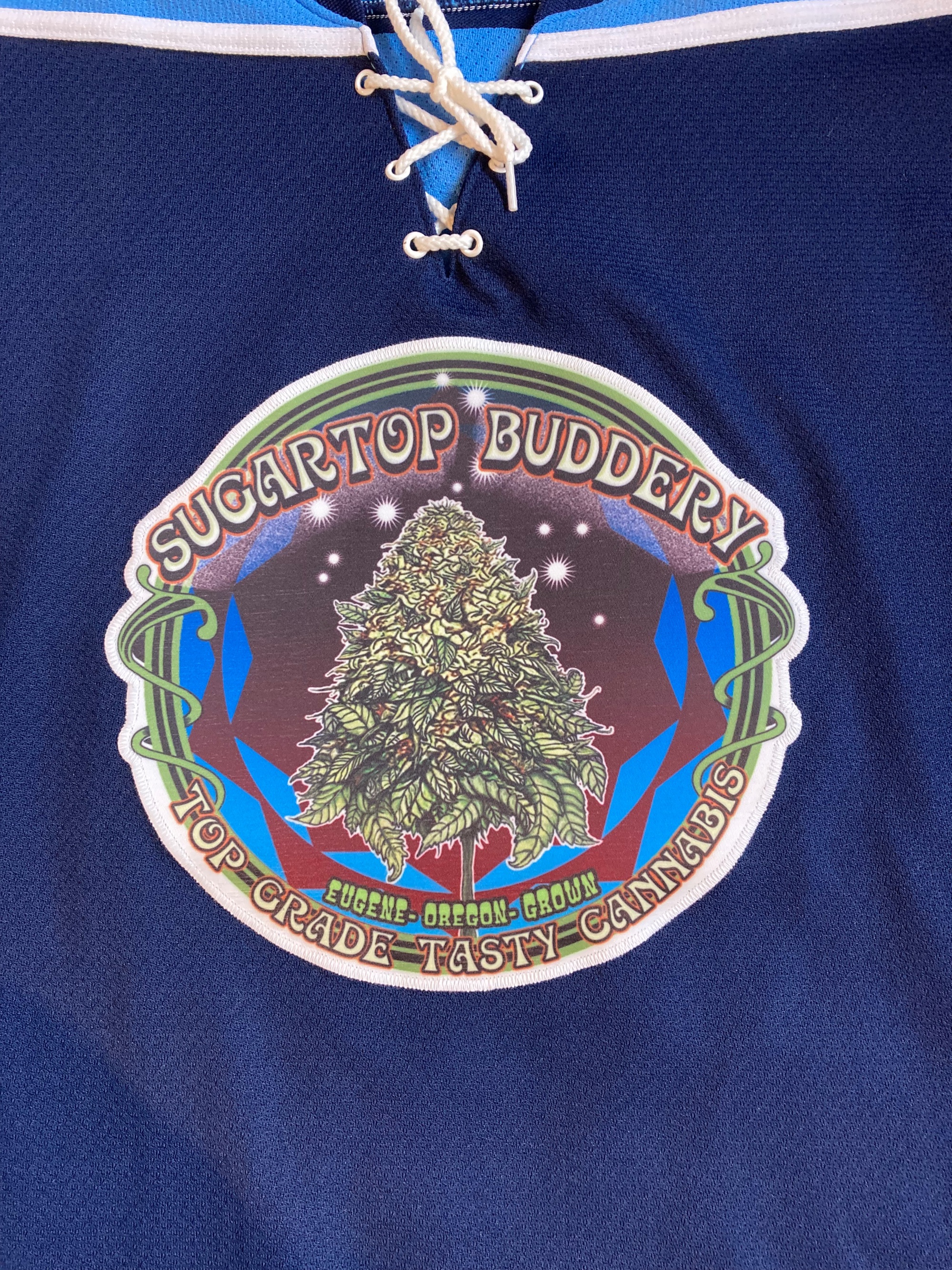 Bud logo on dark jersey